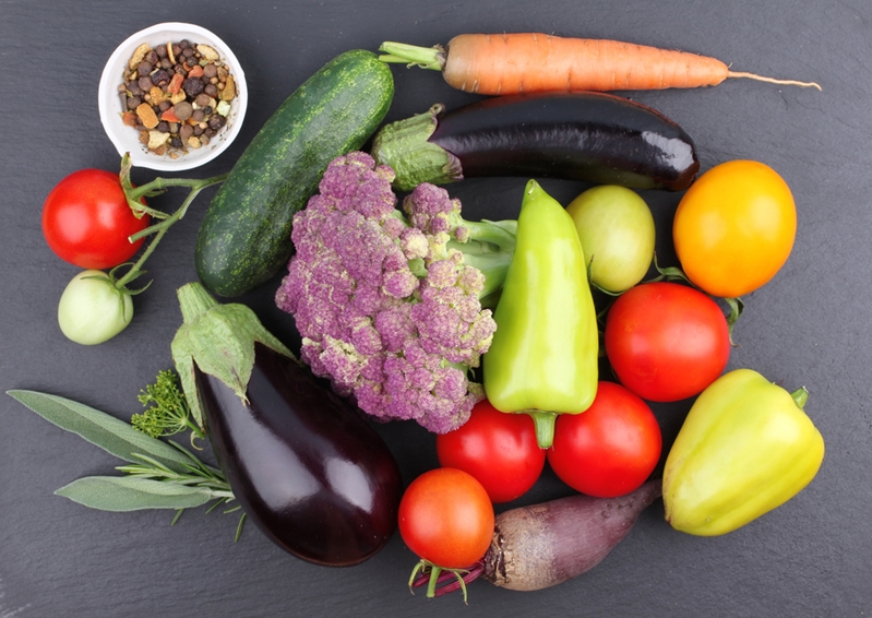 A pile of fresh fruits and vegetables.